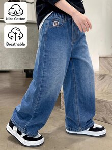 SHEIN 男童牛仔長褲，四季皆宜，柔軟棉質，休閒街頭風，彈性腰頭，口袋貼布設計，寬鬆錐形剪裁，中藍色水洗褲 - 中等水洗藍 - 查看 1
