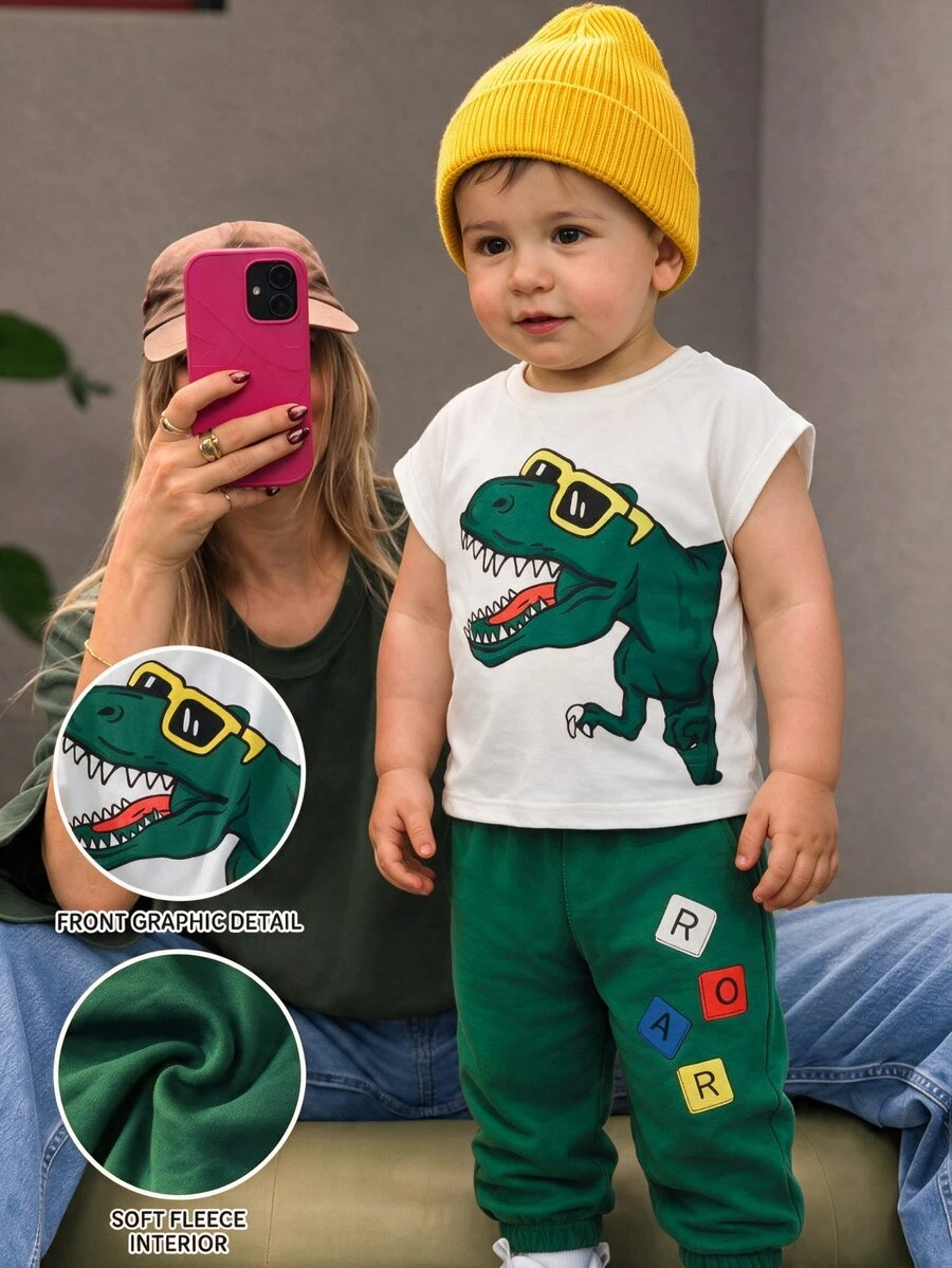 THE HAPPY LOOK Set de 2 piezas con parte superior de manga corta de cuello redondo suave con estampado de dinosaurio de dibujos animados y pantalones jogger de cintura elástica para niño pequeño - Multicolor - Ver 1
