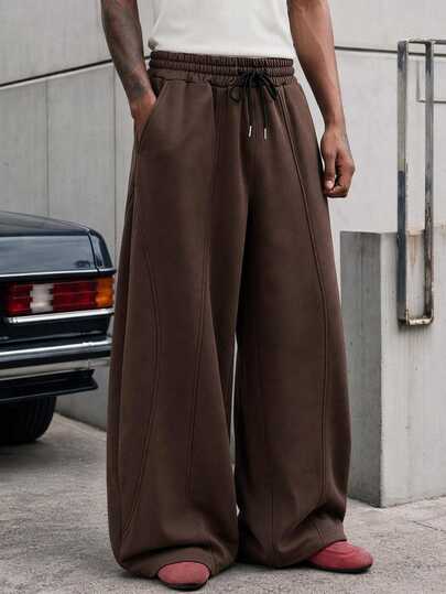 AXEPEAK Pantalones de chándal casuales y holgados para hombre, talla estándar, color marrón, cintura elástica, diseño liso con línea & plisado, bolsillos, deportes, streetwear, primavera/otoño