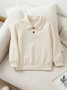 SHEIN 這款運動衫適合男孩在冬季、秋季和春季 5-15°C 的溫度下戶外通勤穿著。設計展現紳士風格，提花面料營造休閒優雅氛圍。翻領設計增添時尚感，滿足不同季節的穿著需求。簡約大方的風格易於搭配其他衣物，適合各種場合。 - 杏色 - 查看 4
