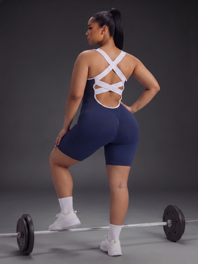 Powerista Women's Plus Size Summer Seamless Sleeveless Ribbed Workout Jumpsuit Open Back Design In Navy Blue With Trim Perfect For Gym And Activewear Tropical