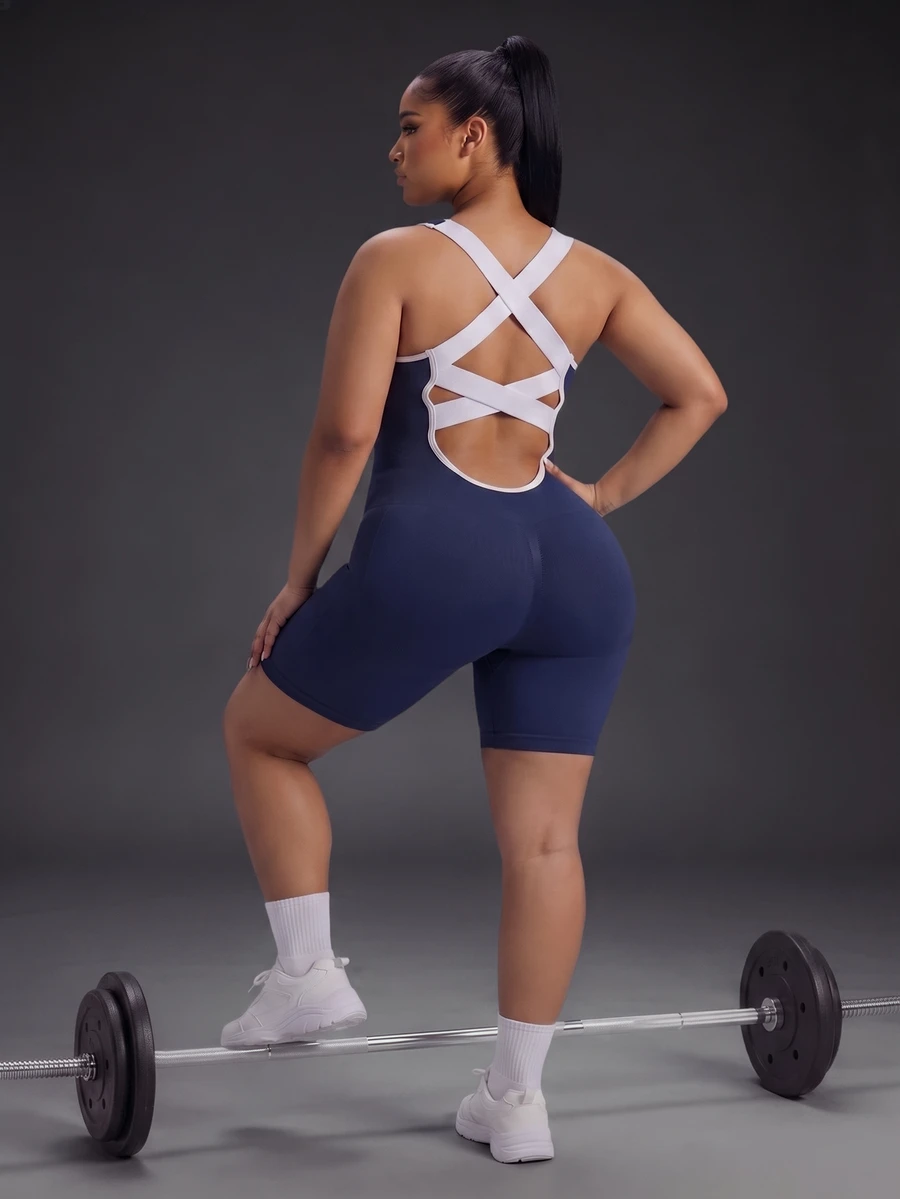 Powerista Women's Plus Size Summer Seamless Sleeveless Ribbed Workout Jumpsuit Open Back Design In Navy Blue With Trim Perfect For Gym And Activewear Tropical