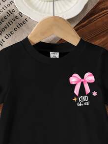 SHEIN 女嬰「God Says I Am Strong」蝴蝶結珍珠愛心印花圓領短袖可愛 Y2K 休閒黑色圖案 T 恤，適合學校、假期、夏季度假 - 黑色 - 查看 7