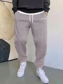 Manfinity Homme Pantalones jogger con cordón en la cintura y bolsillo para hombres con estampado de letras - Gris - Ver 3