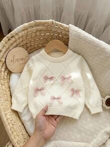 SHEIN Vintaside Kids 3個月至3歲女嬰米白色鑽石泡泡紋理針織圓領毛衣，淺粉色3D緞面蝴蝶結長袖上衣，純色柔和溫馨春秋針織套頭外套，適合生日拍照 - 米色 - 查看 3