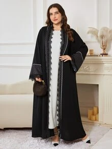 Al Najma Women's Elegant Minimalist Polka Dot Lace Trim Loose Fit Fashion Plus Size Abaya - Black - View 1