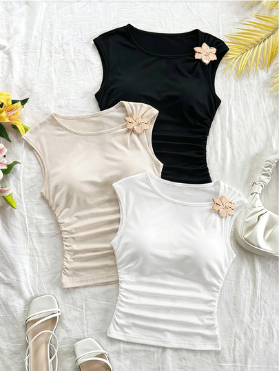 Zolique Women's Sleeveless Short Black And White Apricot Three-Piece Top With 3D Flower Detail, Pleated Waist Slim Fit Asymmetric Neck Casual Outing T-Shirt