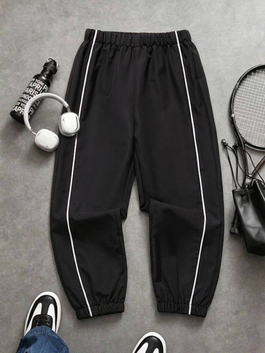 SHEIN 兒童小男孩黑色運動休閒時尚簡約實用百搭軟舒適彈性腰長褲,附裝飾抽繩,適合日常穿著、返校、旅行、運動,四季皆宜,秋季穿搭長褲 - 黑色 - 查看 1