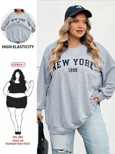 SHEIN CURVE+ بلوزة رياضية نيويورك برسومات لغير المنتظم الطول بأكمام طويلة وياقة مستديرة موديل فضفاض وكاجوال للنساء، موسم الخريف/الشتاء