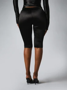 BABYPHAT Satin Biker Shorts High Waist Fitted Knee Length Stretch Shorts With Cat Charm Detail - Black - View 3