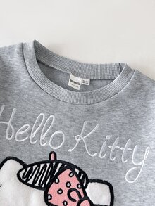 HELLO KITTY AND FRIENDS | SHEIN 青少年女孩秋冬休閒抓絨內裡加厚運動衫套裝，聯名貓頭蝴蝶結印花，寬鬆圓領落肩長袖套頭衫搭配印花百褶寬腿直筒運動長褲，運動風兩件式灰色花卉套裝 - 灰色 - 查看 4