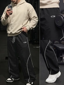 GymBeat Men's Lightweight Woven Sports Pants,Stylish Letter Design Drawstring Waist Baggy Workout Gym Clothes,Athletic Track Sweatpants For Outdoor Training - Black - View 3