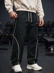 GymBeat Men's Lightweight Woven Sports Pants,Stylish Letter Design Drawstring Waist Baggy Workout Gym Clothes,Athletic Track Sweatpants For Outdoor Training - Black - View 6