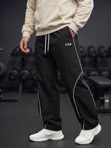 GymBeat Men's Lightweight Woven Sports Pants,Stylish Letter Design Drawstring Waist Baggy Workout Gym Clothes,Athletic Track Sweatpants For Outdoor Training - Black - View 1