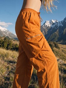 WanderVale Women's Solid Color Drawstring Waist Cargo Pocket Cuffed Outdoor Long Pants - Orange - View 3