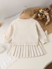 SHEIN Playful Pals 女嬰蝴蝶結裝飾圓領長袖針織套頭上衣與百褶針織裙套裝，秋冬款 - 杏色 - 查看 2