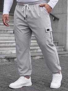 Manfinity CasualCool 男士加大码休闲工装裤，适合日常休闲穿着、周末出游、户外活动、旅行、探险以及与朋友的社交聚会。这款裤子是男士衣橱中不可或缺的百搭单品，也是送给男朋友或老公的绝佳礼物。秋季 - 淺灰色 - 查看 4