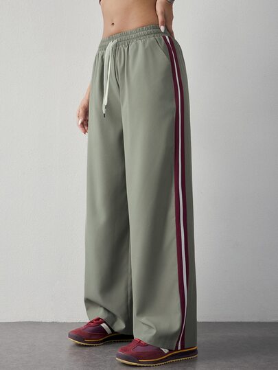Dewbera Dewbera Pantalones de chándal holgados de pierna ancha con cordón en la cintura y rayas laterales para yoga y estilo de vida para mujer