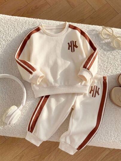 SHEIN Conjunto de 2 piezas para niño joven, sudadera de punto con patrón de letras, manga larga y forro térmico, estilo casual deportivo versátil, con pantalones jogger, ropa de invierno otoño/invierno