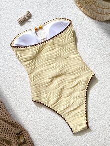 Bonvoyette Solid Color Wavy Pleated Textured Fabric Spaghetti Strap Design Hollow Chest Amber Bead Decor Contrast Floral Trim Casual Vacation Women One-Piece Swimsuit - Apricot - View 2