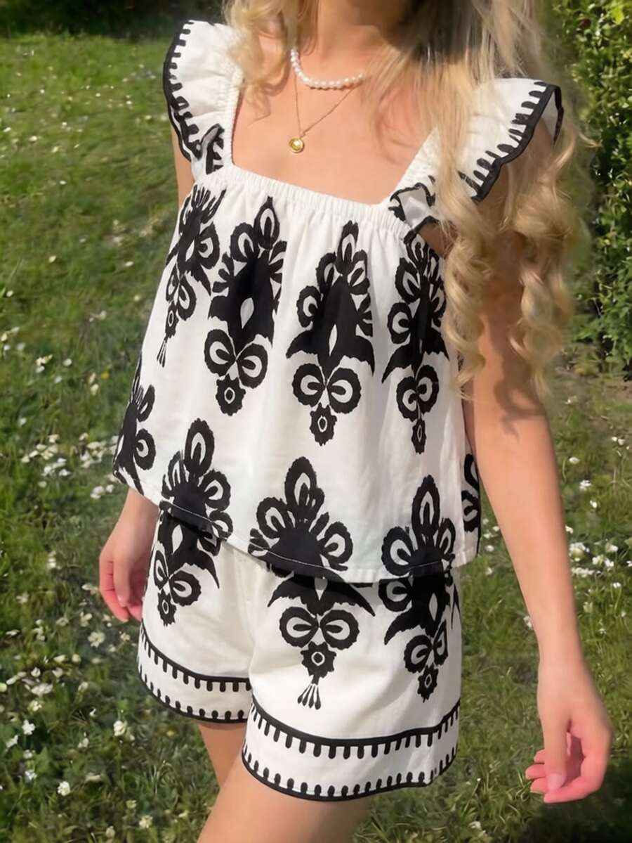 SHEIN Tween Girls 2pcs/Set Black And White Geometric Floral Print Flutter Sleeve Top Set, Holiday Outfits, Casual - Black and White - View 1