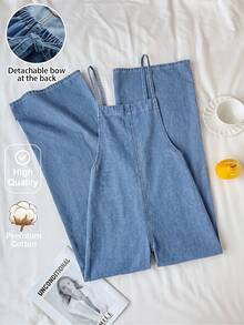 SHEIN Genkimix Kids 少女牛仔吊帶長褲，柔軟棉質休閒款，時尚百搭舒適簡約，細肩帶交叉後背設計，附可拆式大蝴蝶結，寬鬆直筒版型，中藍色水洗牛仔吊帶褲連身褲，適合日常穿著與度假 - 中等水洗藍 - 查看 9
