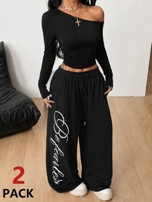 Coolane Conjunto de dos piezas para mujer talla grande, camiseta de cuello asimétrico y pantalones de chándal de pierna ancha, color negro, elegante para uso diario, salidas y deportes, otoño e invierno - Negro - Ver 8