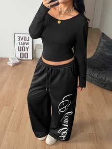 Coolane Conjunto de dos piezas para mujer talla grande, camiseta de cuello asimétrico y pantalones de chándal de pierna ancha, color negro, elegante para uso diario, salidas y deportes, otoño e invierno - Negro - Ver 2