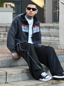 Devon Thys 男士休闲宽松拼接运动裤，百搭实用，适合街头风、日常休闲、周末郊游、音乐节、社交聚会等各种场合。这款裤子是男士衣橱中必备的百搭单品，也是送给男友或老公的绝佳礼物。阔腿设计 - 黑色 - 查看 1