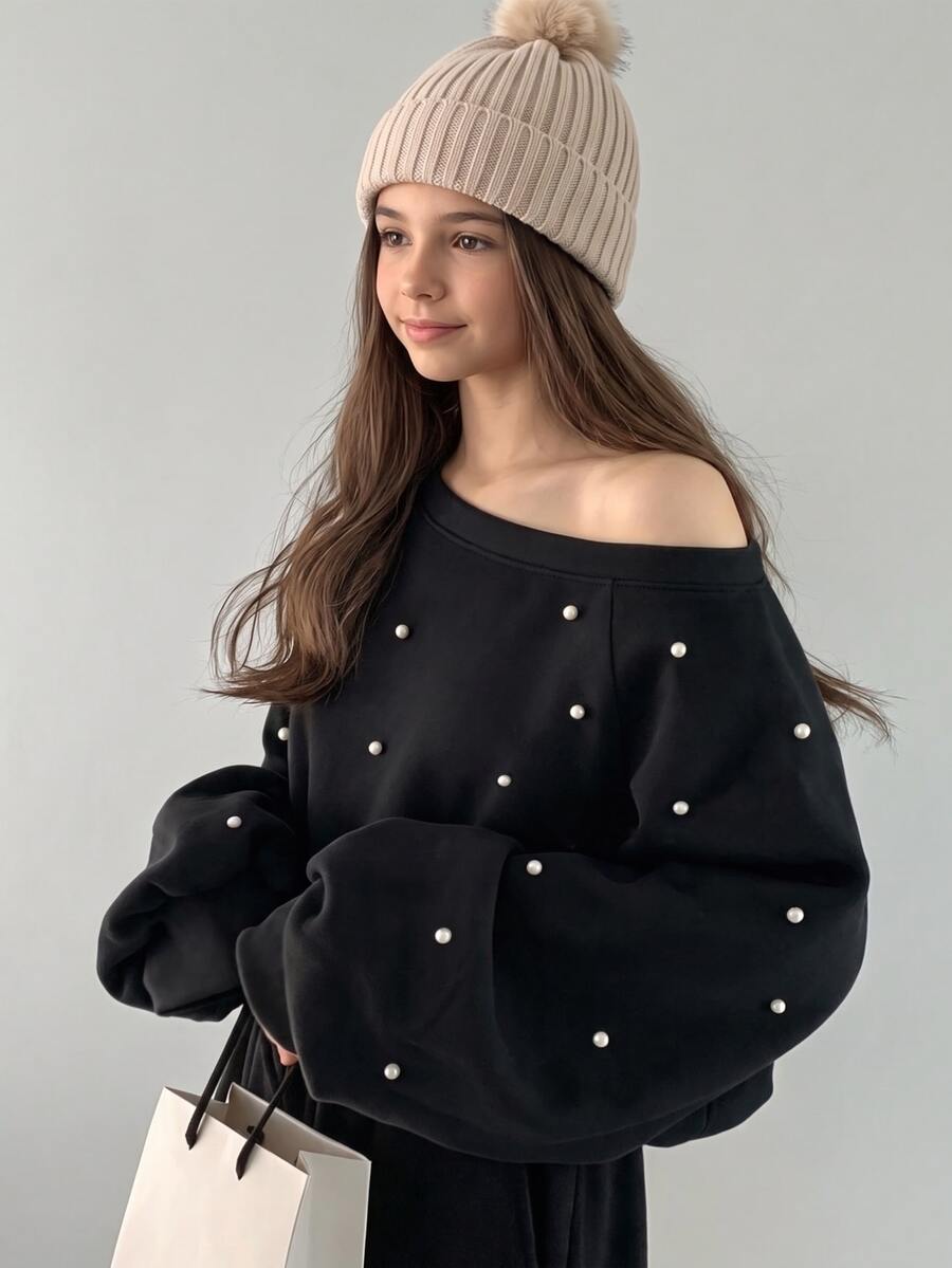 SHEIN 1pc Girls Sweet Cool Style Asymmetrical Shoulder Sweatshirt, Suitable For Daily School, Casual Street Wear, Spring/Autumn, Heavy Pearl Embellished Design Asymmetrical Shoulder Long Sleeve Pullover Top - Black - View 1
