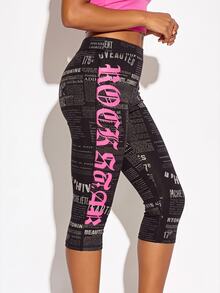 SUMWON WOMEN High Rise Cropped Leggings With Newspaper Print And Neon Pink Gothic Text Side Leg Detail Capri Length - Multicolor - View 1