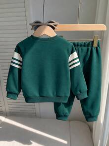 Boys (Small) Sweatshirt Set, Top Is Dark Green And Beige Colorblock Sweatshirt With "CHICAGO" And Large Number 67 Printed On Chest, Sleeves With Two White Horizontal Stripes, Ribbed Collar And Cuffs, Matching Dark Green Sweatpants With Double White Vertical Stripes On Sides, Number 67 Printed On Pants, Ribbed Cuffs - Multicolor - View 2