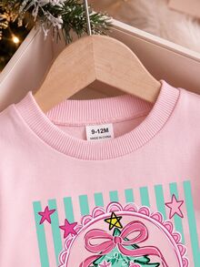 SHEIN Playful Pals 嬰兒女童 T-shirt 套裝，正面印有精緻蝴蝶結與聖誕樹圖案，綠色直條紋背景配粉色星星裝飾，羅紋領口與袖口，下身為米白色底綠色直條紋長褲 - 彩色 - 查看 6