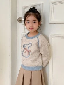 Dazy Kids كنزة صوفية للبنات الصغيرات بياقة مستديرة وأكمام طويلة مزينة بفيونكة لطيفة وحواف متباينة الألوان - لون مشمشي - مشاهدة 6
