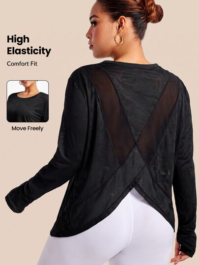 Easithlete Camiseta de manga larga asimétrica con estampado de camuflaje y espalda con cruce de tiras, talla grande