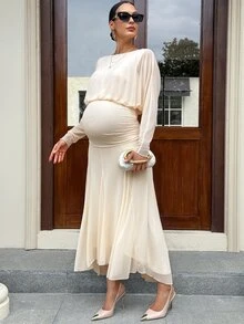 MaterniWear فستان أنيق للحوامل بلون موحد وياقة دائرية وأكمام طويلة بتصميم جناح الخفاش لفصل الخريف - لون مشمشي - مشاهدة 5