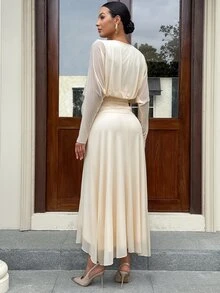 MaterniWear فستان أنيق للحوامل بلون موحد وياقة دائرية وأكمام طويلة بتصميم جناح الخفاش لفصل الخريف - لون مشمشي - مشاهدة 8