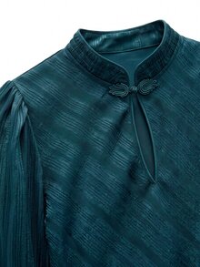 Nöista Deep Emerald Blouse With A High Neck, Delicate Frog Closures, Gathered Peplum Hem And Subtle Metallic Sheen. Elegant Statement Piece. - Dark Green - View 9