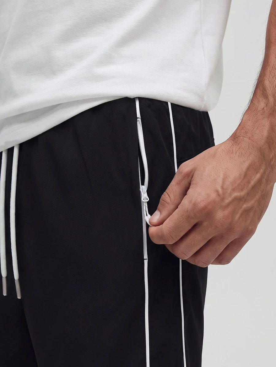 TekDrob Water Repellent & UV Protection Active Shorts With Contrasting Details And Zippered Pockets - Black - View 1