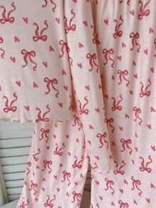 SHEIN 少女睡衣套裝，簡約可愛復古蝴蝶結圖案，圓領短袖長褲，荷葉邊下擺，柔軟舒適親膚針織羅紋居家睡衣，2件組 - 粉色 - 查看 9