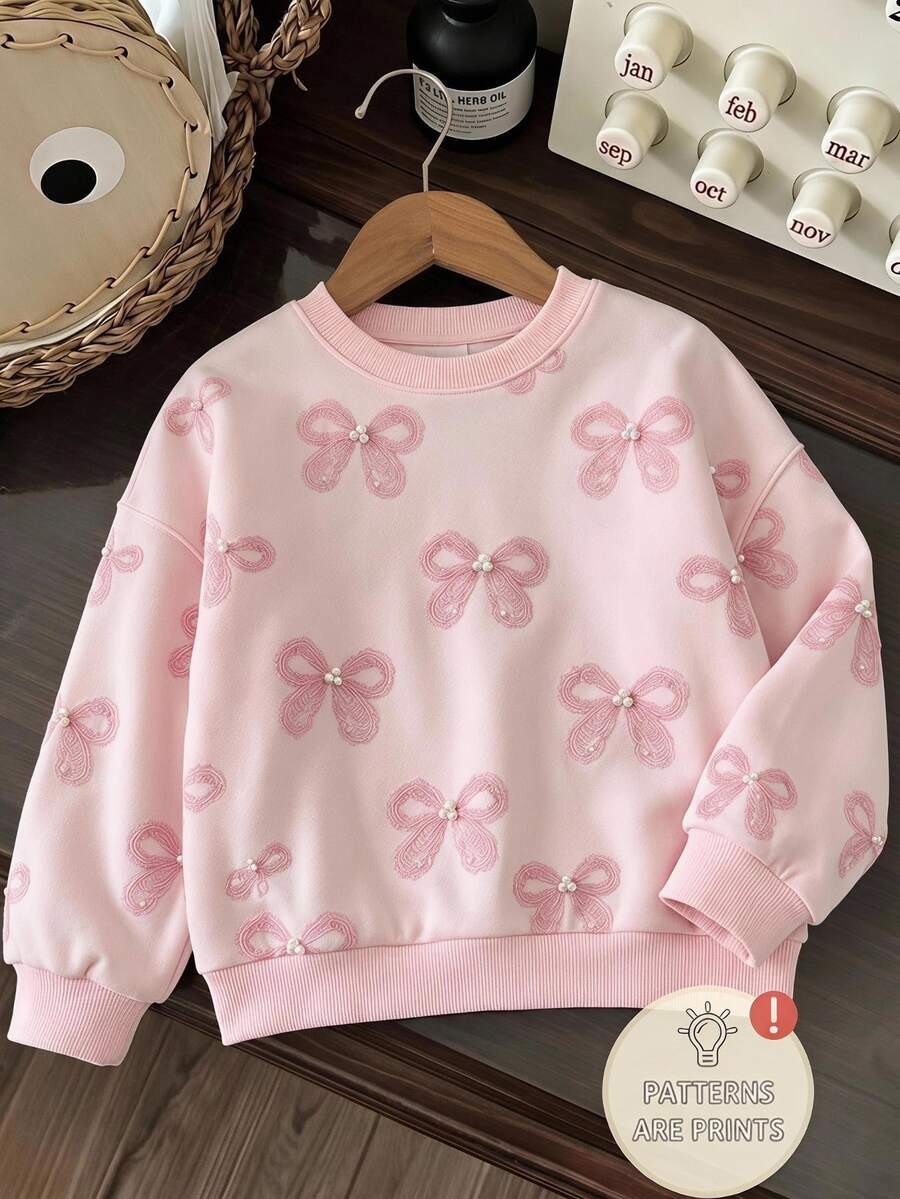 SHEIN 女童淺粉色圓領衛衣，仿3D毛絨珍珠蝴蝶結裝飾，寬鬆落肩長袖套頭上衣外套，適合秋季嬰兒洗禮派對