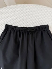 SHEIN 兒童小男孩休閒日常舒適字母印花直筒寬鬆梭織長褲，適合日常穿著、上學、旅行、度假、節日、派對，四季皆宜 - 黑色 - 查看 4