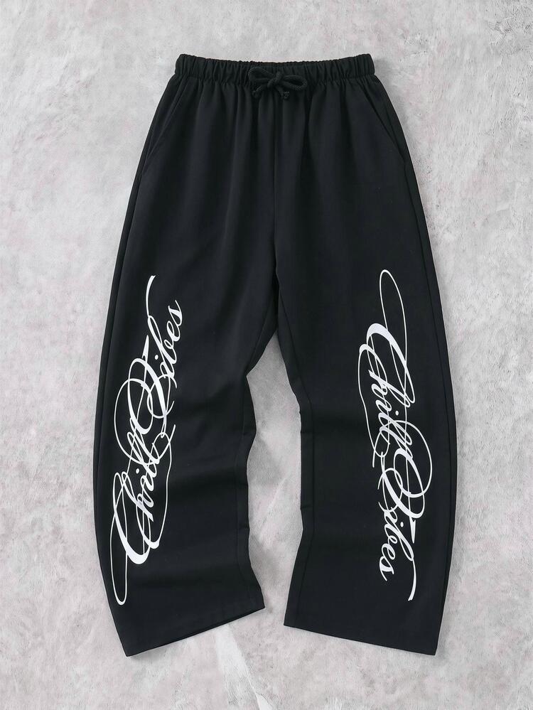 SHEIN Kids Young Boy Casual Daily Comfortable Letter Print Pattern Straight Leg Loose Woven Long Pants, Suitable For Daily Wear, School, Travel, Vacation, Holiday, Party, All Seasons - Black - View 1