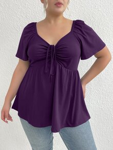 Rometta Kaos Kasual Lengan Pendek Wanita Ukuran Besar Warna Polos dengan Ruffle, Leher V, dan Ikatan di Depan - Purple - View 9