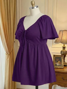 Rometta Kaos Kasual Lengan Pendek Wanita Ukuran Besar Warna Polos dengan Ruffle, Leher V, dan Ikatan di Depan - Purple - View 2