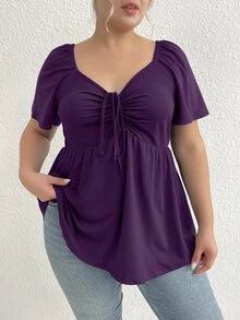 Rometta Kaos Kasual Lengan Pendek Wanita Ukuran Besar Warna Polos dengan Ruffle, Leher V, dan Ikatan di Depan - Purple - View 10