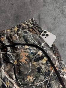 AXEPEAK Pantalones cortos casuales sueltos con cordón en la cintura y estampado de ramas para hombres - Multicolor - Ver 3
