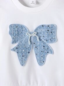 SHEIN Young Girl Round Neck Long Sleeve Sweatshirt With Bow Decoration, Sweet And Fashionable, Paired With Denim Pleated Skirt, Suitable For Autumn, Fashionable Perfect For Daily Wear, Home, Outings And Gatherings - White - View 7