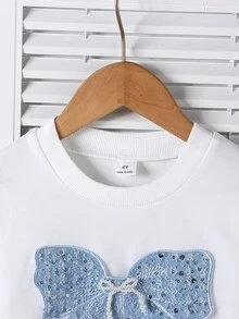 SHEIN Young Girl Round Neck Long Sleeve Sweatshirt With Bow Decoration, Sweet And Fashionable, Paired With Denim Pleated Skirt, Suitable For Autumn, Fashionable Perfect For Daily Wear, Home, Outings And Gatherings - White - View 6