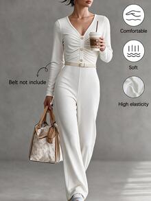 SHEIN Spring New Beige Ribbed V-Neck Long Sleeve Jumpsuit, Twisted Front Waist With Flared Hem, Elegant Style, Suitable For Graduation, Christmas, Commuting, Vacation And Other Occasions, Women's Casual Jumpsuit - White - View 1